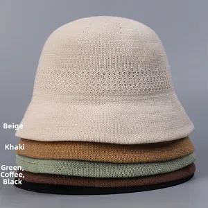 Stack of breathable knit bucket hats in beige, khaki, green, coffee, and black tones