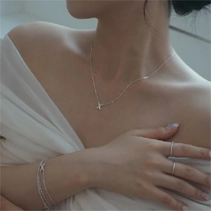 Elegant 925 sterling silver X-shaped pendant necklace and multi-layer bracelet set for women