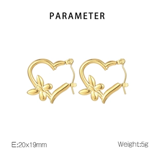 Detail shot of golden heart butterfly earrings showing dimensions 20x19mm and 5g weight