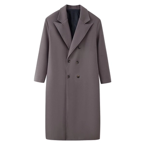 Detailed front view of long double-breasted wool coat in dark mauve with notch lapels