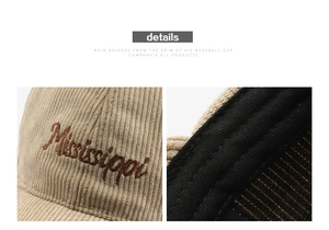 Close-up of vintage corduroy baseball cap fabric texture and Mississippi embroidery