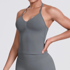 Detailed macro view of the seamless grey ribbed texture on women's athletic yoga set