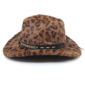 Detail of leopard print faux fur cowboy hat with a leather band and vintage metal logo