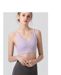 Detailed close-up of light purple sports bra with V-neck and wide support band