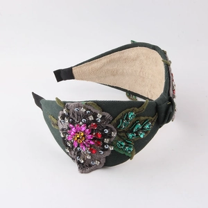 Deep green headband with exquisite floral embroidery and sparkling colorful sequins