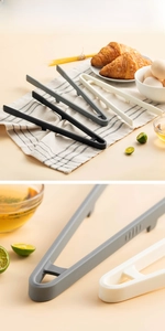 Detail of heat-resistant silicone food tongs with non-slip texture and V-shaped design