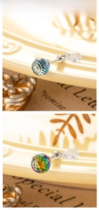 Close-up of 6mm faceted crystal ball earrings in light blue and iridescent shades
