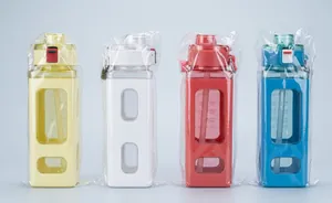 Detailed view of square 700ml plastic water bottles with silicone sleeves and carry straps