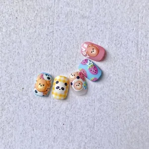 5D stereoscopic press-on nails featuring cute bear, panda, and strawberry patterns