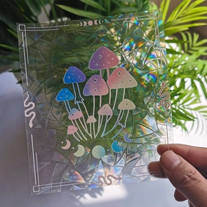 Holographic mushroom and moon phase suncatcher window decal with rainbow prism effect