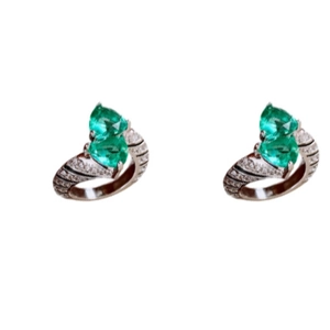 Vintage silver snake skin earrings with green heart-shaped zircon stones on white background