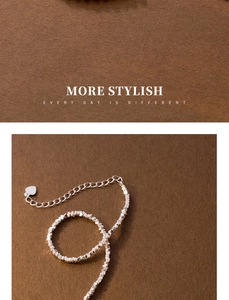 Detail of S925 sterling silver crushed silver necklace with an engraved heart pendant