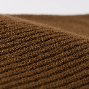 Classic caramel brown knit beanie with thick texture for winter warmth and outdoor style