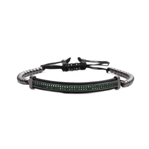 Bracelet perlé ajustable avec perles noires et tube métallique incrusté de zircons verts