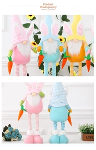 Detail of Easter gnome dolls with rabbit ears, striped legs, and small orange carrots