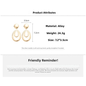 Détails des grandes boucles d'oreilles gouttes dorées avec dimensions et poids précis