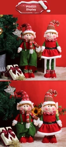 Détails des poupées lutins de Noël en peluche rouge et verte avec des cloches dorées