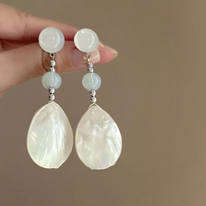 Minimalist silver needle drop earrings with blue beads and white resin shell pendants