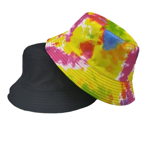 Reversible bucket hat set with solid black and colorful tie-dye patterns for summer sun protection