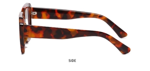 Detailed side view of tortoise shell sunglasses featuring wide temples and mottled brown finish
