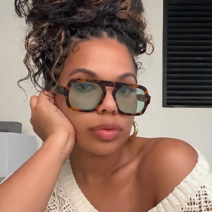 Fashionable oversized tortoise sunglasses with green lenses for outdoor style