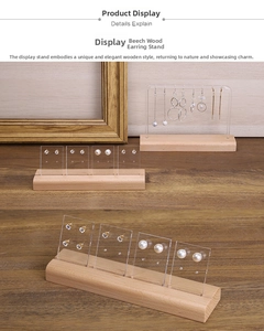 Detailed macro view of the natural beech wood base and clear acrylic earring organizer stand