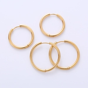 Polished gold hoop earrings in two sizes shown on a plain white background