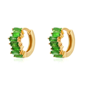 Detail of gold hoop earrings with emerald green rectangular zircon stones on white background
