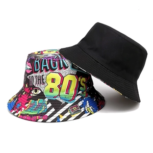 Detail of 80s retro bucket hat with vintage patterns showing double-sided reversible design