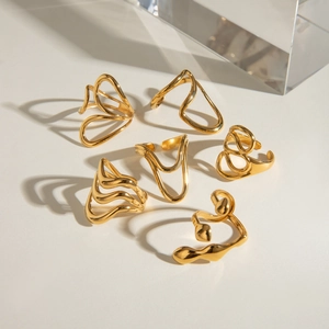 Irregular liquid style stainless steel gold rings with geometric cutout designs