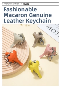 Close-up of elephant leather keychains in multiple colors with lychee texture and metal clips
