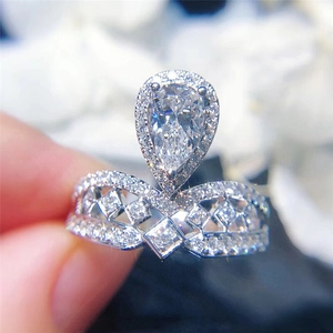 Exquisite crown tiara ring with pear-shaped cubic zirconia and micro-pave diamonds