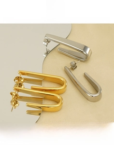 Boucles d'oreilles en acier titane en forme de U, finitions dorée et argentée polies