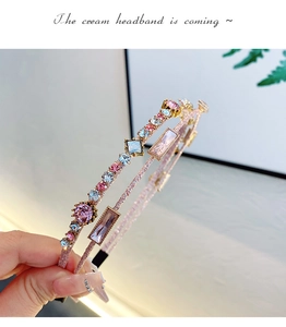 Close-up of dual-layer rose gold headband with pink and blue sparkling rhinestones