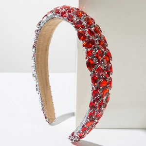 Baroque padded headband with sparkling red crystals on minimalist white pedestals