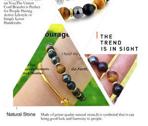 Macro view of beads featuring natural tiger eye, magnetic hematite, and black obsidian stones