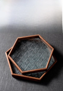 Close-up of hexagonal wood trays with vintage begonia pattern glass in 45-degree view