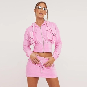 Women's pink velvet cropped hoodie and mini skirt set with utility pockets