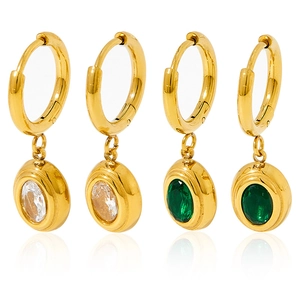 Elegant gold hoop earrings with white and emerald green oval gemstones on white background