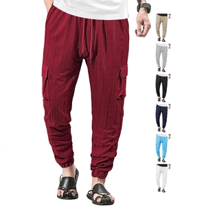 Men's loose breathable drawstring jogger pants in various colors with waffle texture