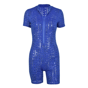 Detail of blue hollow-out mesh bodysuit featuring a front zipper and textured ripped holes