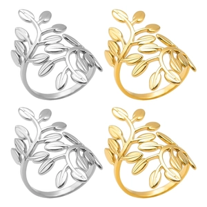 Detailed view of leaf vine napkin rings in polished gold and silver finishes