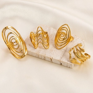 Irregular 18K gold plated titanium steel rings set with elegant wave and spiral designs