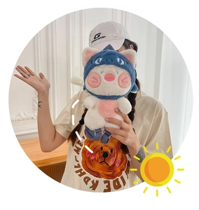 Detailed view of the soft plush shark cat backpack with a fluffy texture and pastel colors