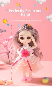 Detail view of a 17cm doll with curly purple hair and pink lace dress for girls