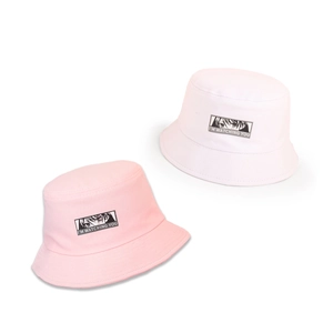 Kids wide brim bucket hats in pink and white with cartoon eye embroidery and text