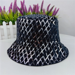 Close-up of a black bucket hat with silver sequins and quilted diamond pattern