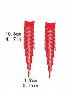 Detail of red rhinestone long tassel earrings showing size 10.6cm length and 1.9cm width