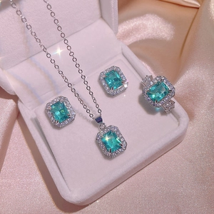 Luxury Paraiba zircon jewelry set with emerald-cut turquoise stones in silver finish