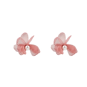 Macro detail of pink organza lace flower earrings with elegant central faux pearls